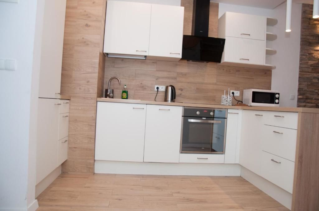 Апартаменты Apartament Obrzeżna 3 Deluxe Варшава